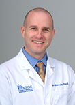 Clint Blankenship in white coat portrait