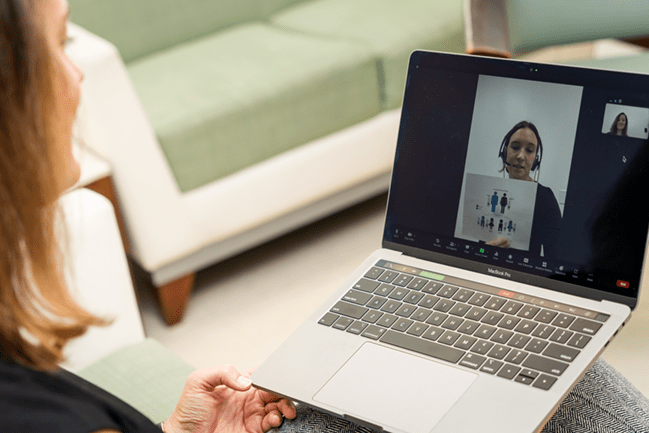 woman receives telehealth counseling