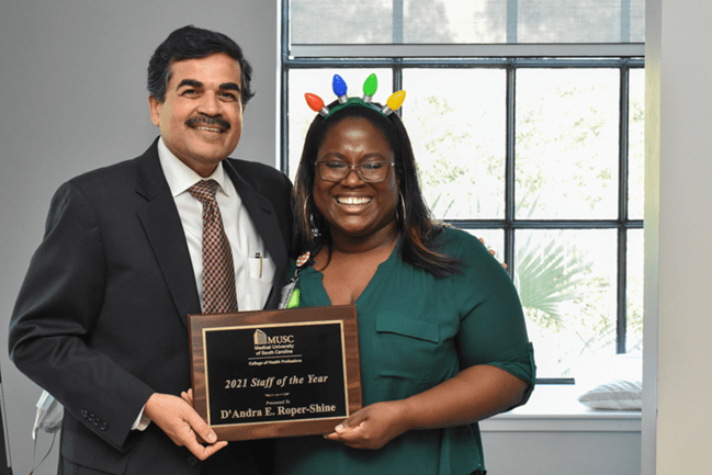 D'Andra Roper-Shine with dean Kapasi at the faculty and staff awards