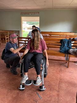 Meghan on wheelchair Uganda