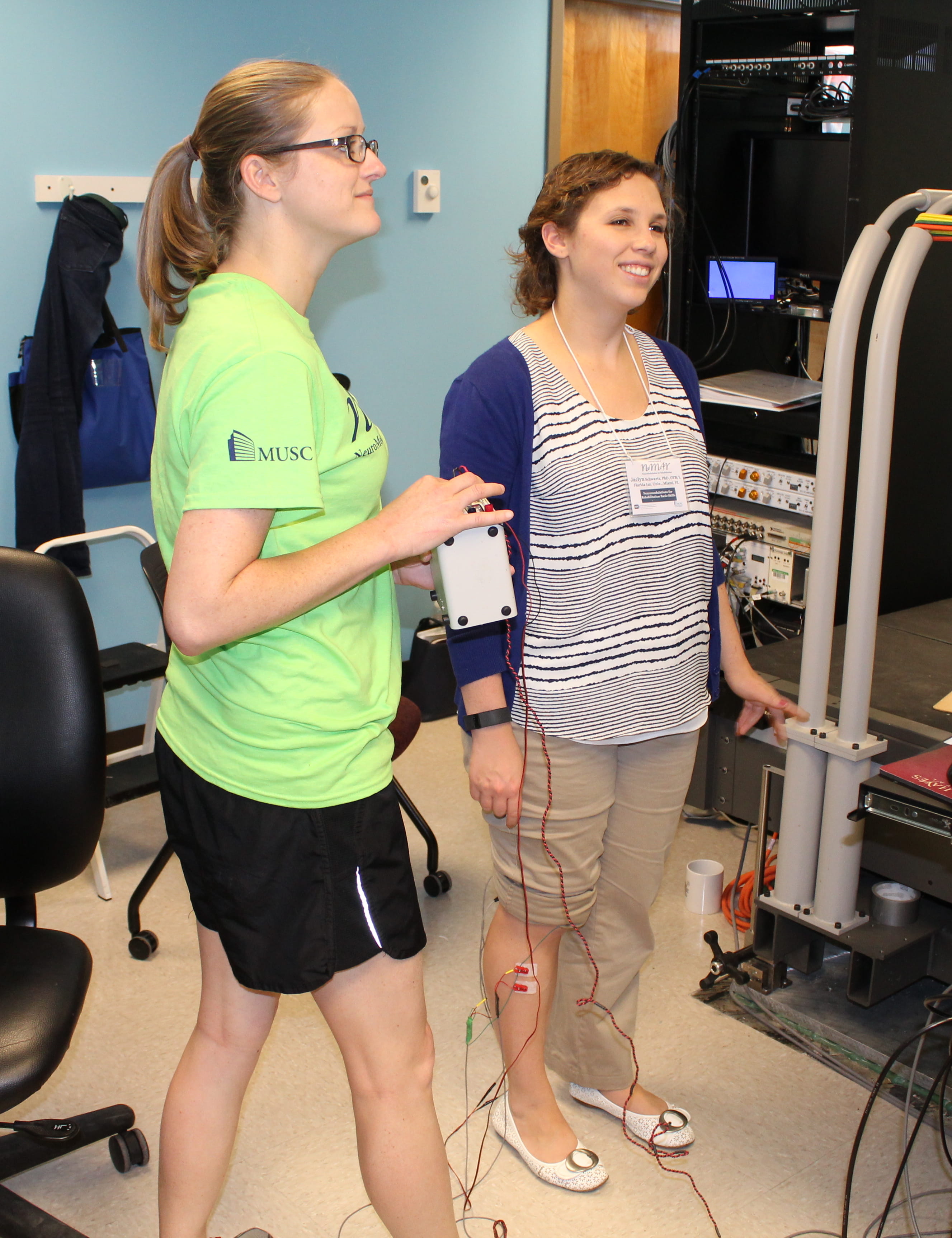 Workshop participants demonstrating Operant Conditioning of EMG-evoked potential
