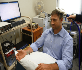 The timing of the TMS and applied sensory stimulation of the ulnar nerve result in changes in motor response that can be used to measure brain plasticity