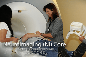 Researcher prepare study participant for MRI session
